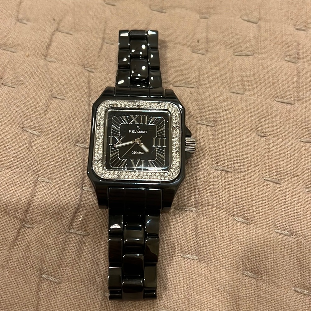 Peugeot ceramic watch with crystal bezel